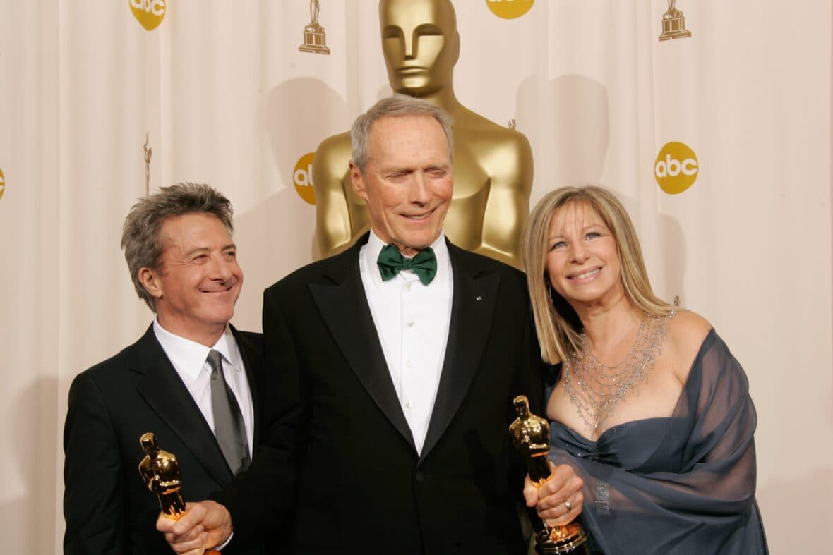 Dustin Hoffman and Barbra Streisand with Clint Eastwood in the trophy room at the 77th Annual Academy Awards in Hollywood on