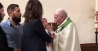 priest slaps baby
