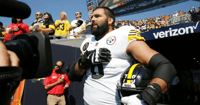 nfl players standing national anthem