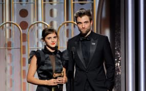 Jan 7, 2018; Beverly Hills, CA, USA; Emma Watson and Robert Pattinson present during the award for Best Director    Motion