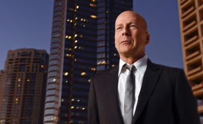 January 31, 2013; Los Angeles, CA, USA; Portrait of Bruce Willis with the Nakatomi Plaza building in the background where the