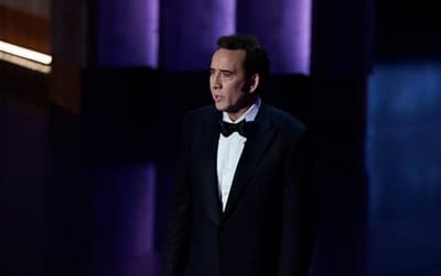 Mar 10, 2024; Los Angeles, CA, USA; Nicolas Cage presents the award for best actor in a leading role during the 96th Oscars at