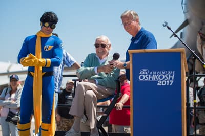 Stan Lee and EAA CEO Jack Pelton help introduce Aviore at Boeing Plaza during AirVenture 2017.Boeing Plaza