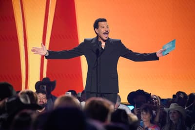 Lionel Richie presents the award for song of the year during the 60th Academy of Country Music Awards at the Ford Center at The