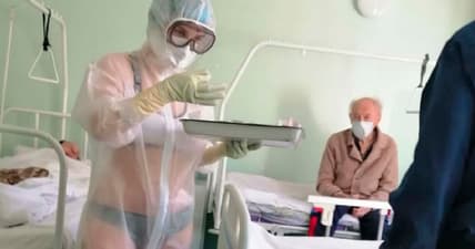 'Hot' Nurse in see-through PPE