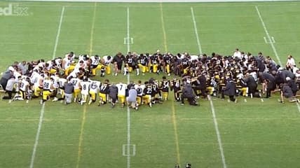 NFL Steelers coach Mike Tomlin take knee prayer