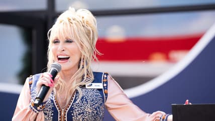 Dolly Parton speaks to the crowd during the grand opening of Dolly's Tennessean Travel Stop  in Cornersville  on Wednesday June