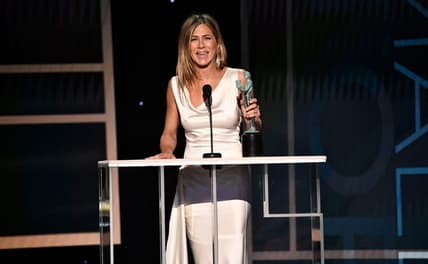 Jennifer Aniston accepts the award for outstanding performance by a female actor in a drama series for her role as Alex Levy in