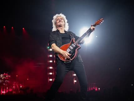 Celebrities Who Have PhDs Brian May of Queen + Adam Lambert performs during their The Rhapsody Tour concert at Bridgestone Arena in Nashville, Tenn.,