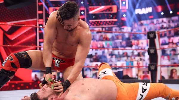 Miz Braun Strowman Injured