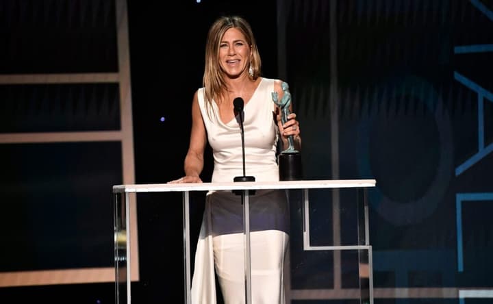 Jennifer Aniston accepts the award for outstanding performance by a female actor in a drama series for her role as Alex Levy in