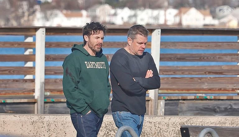 Casey Affleck and Matt Damon walk and talk near the Squantum Yacht Club at Wollaston Beach.