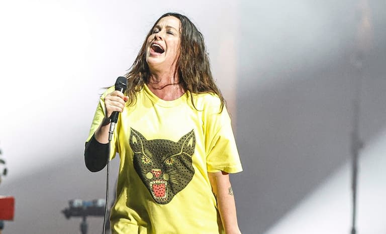Rain showers did not dampen the crowd's enthusiasm for Alanis Morissette on Monday night, Aug. 15, 2022, at the Iowa State Fair