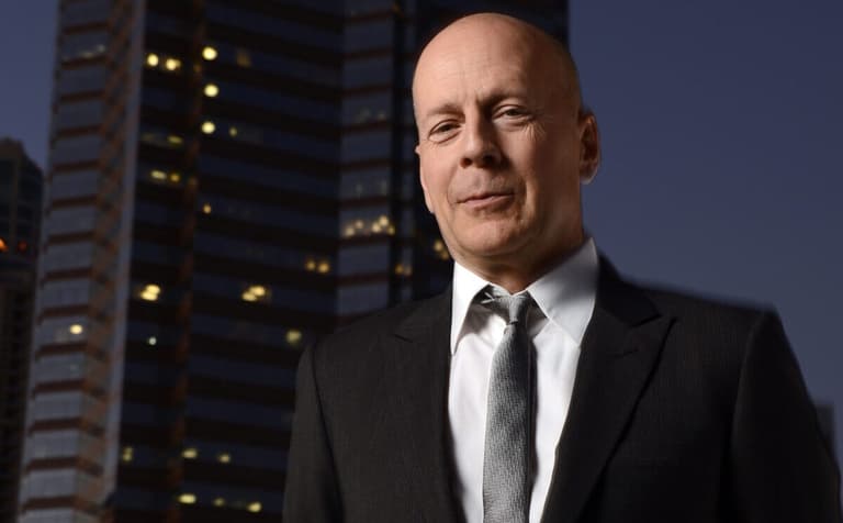 January 31, 2013; Los Angeles, CA, USA; Portrait of Bruce Willis with the Nakatomi Plaza building in the background where the