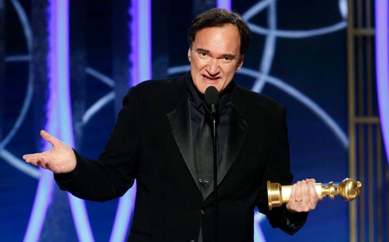 Jan 5, 2020; Beverly Hills, CA, USA; Quentin Tarantino accepts the award for Best Screenplay - Motion Picture for "Once Upon A