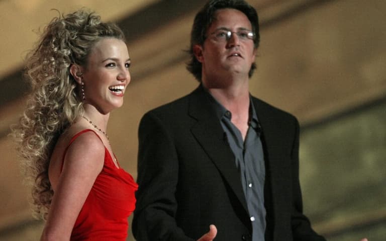 Britney Spears and Matthew Perry on stage during the 44th Annual Grammy Awards at the Staples Center on Feb. 27, 2002.