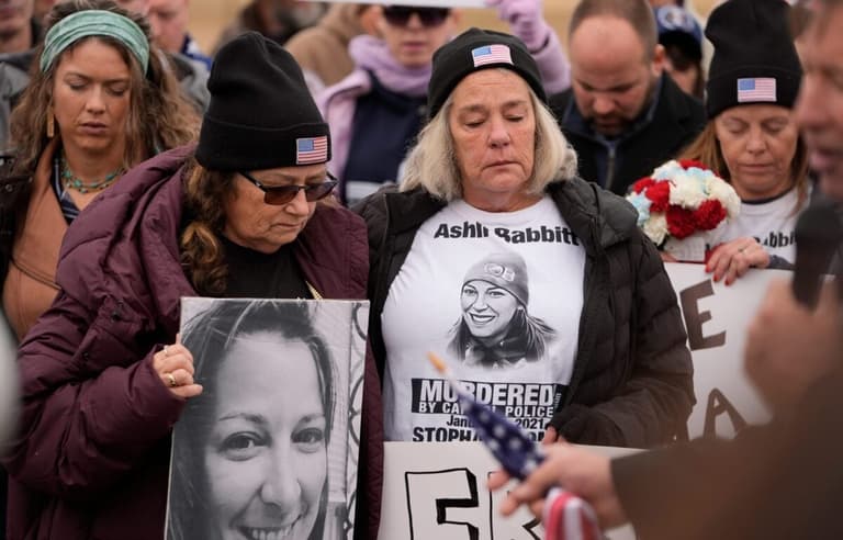 Ashli Babbitt's mother is Micki Witthoeft, center, who became a prominent advocate for her daughter after Babbitt was fatally
