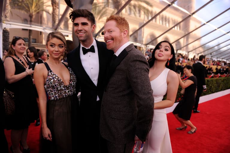 1/25/15 4:17:34 PM -- Los Angeles, CA, U.S.A  -- Ariel Winter (r) jumps into a photo with Sarah Hyland, Justin Mikita and Jesse