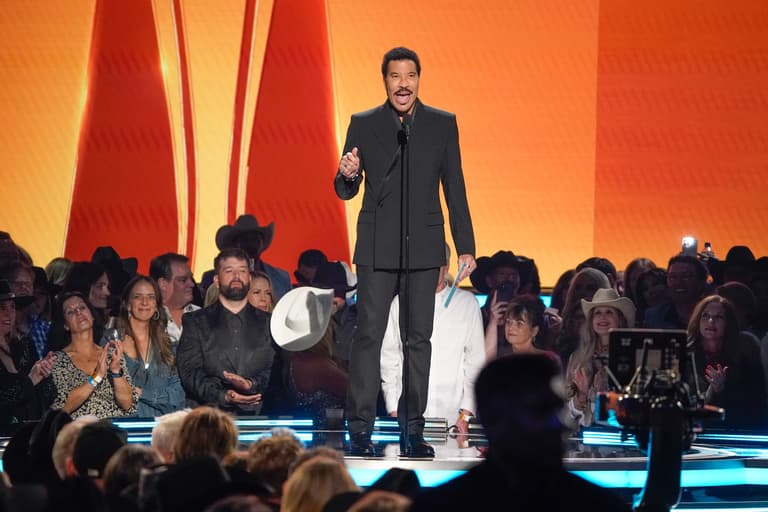 Lionel Richie presents the award for song of the year during the 60th Academy of Country Music Awards at the Ford Center at The