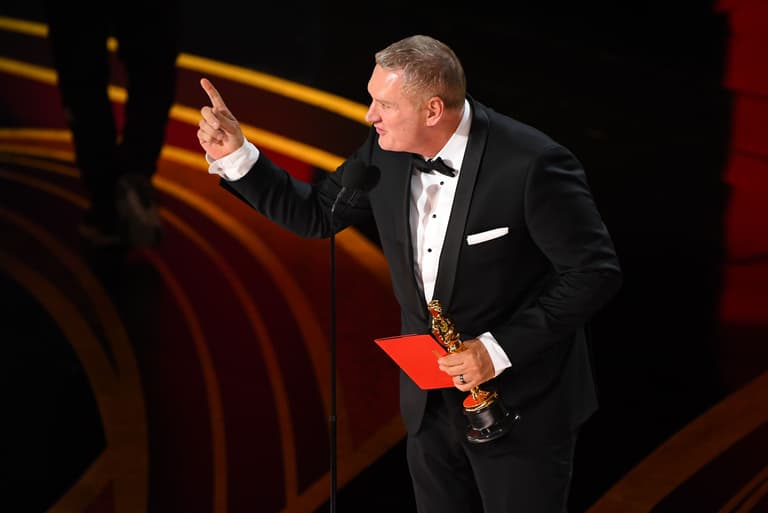 John Ottman accepts the award for achievement in film editing for "Bohemian Rhapsody." Xxx Oscars Rd076 Jpg E Ent Usa Ca