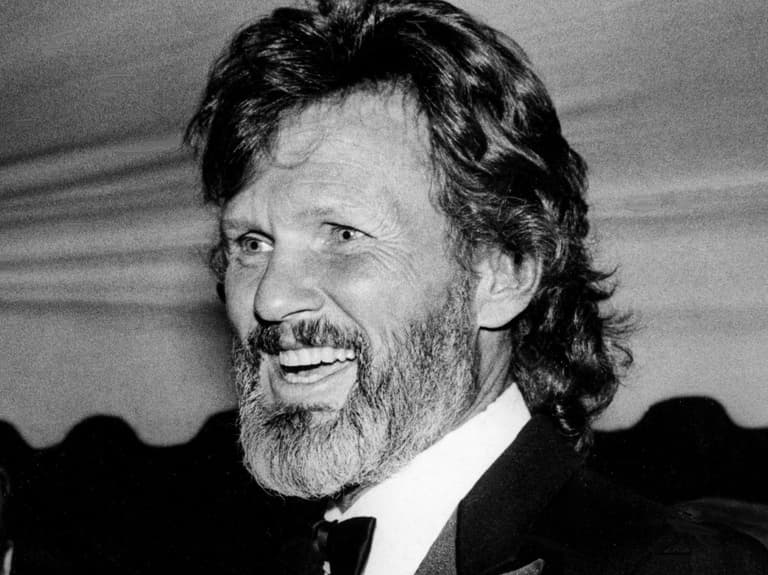 Superstar Kris Kristofferson, right, renews his friendships in Nashville at the annual BMI Awards gala and banquet on Oct. 11,