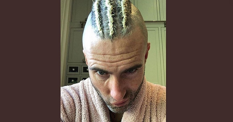 Maroon 5 singer Adam Levine cornrow mohawk cultural appropriation.