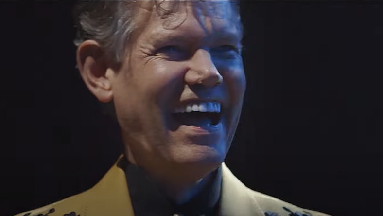 Experience the magic of Randy Travis' comeback with his new song, 'Where That Came From,' featuring his iconic voice recreated through AI.