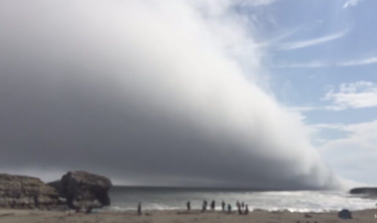 beach invaded by cloud