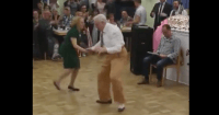 old couple swing dancing