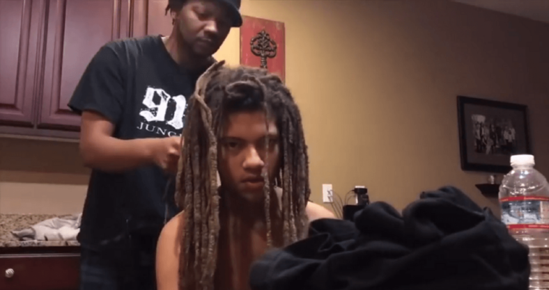 teen cuts his dreads