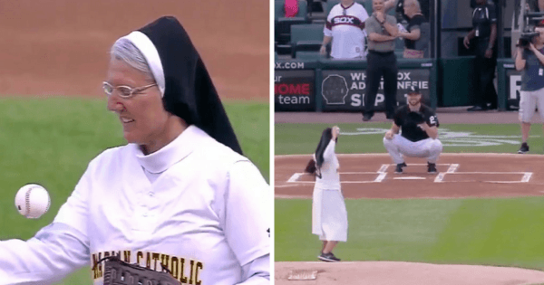 nun throws first pitch