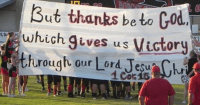 texas cheerleaders bible verse signs