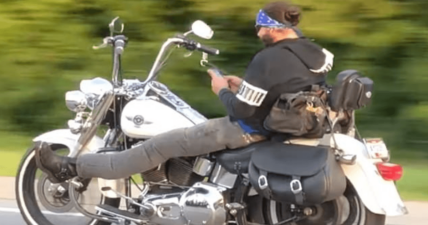 motorcyclist texting while driving