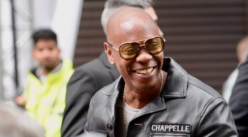 Comedian Dave Chappelle whose Netflix special takes shots at PC culture, stood up for the First and Second Amendment while accepting an award.