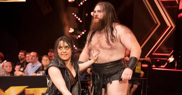 Nikki Cross and Killian Dain during their Sanity run