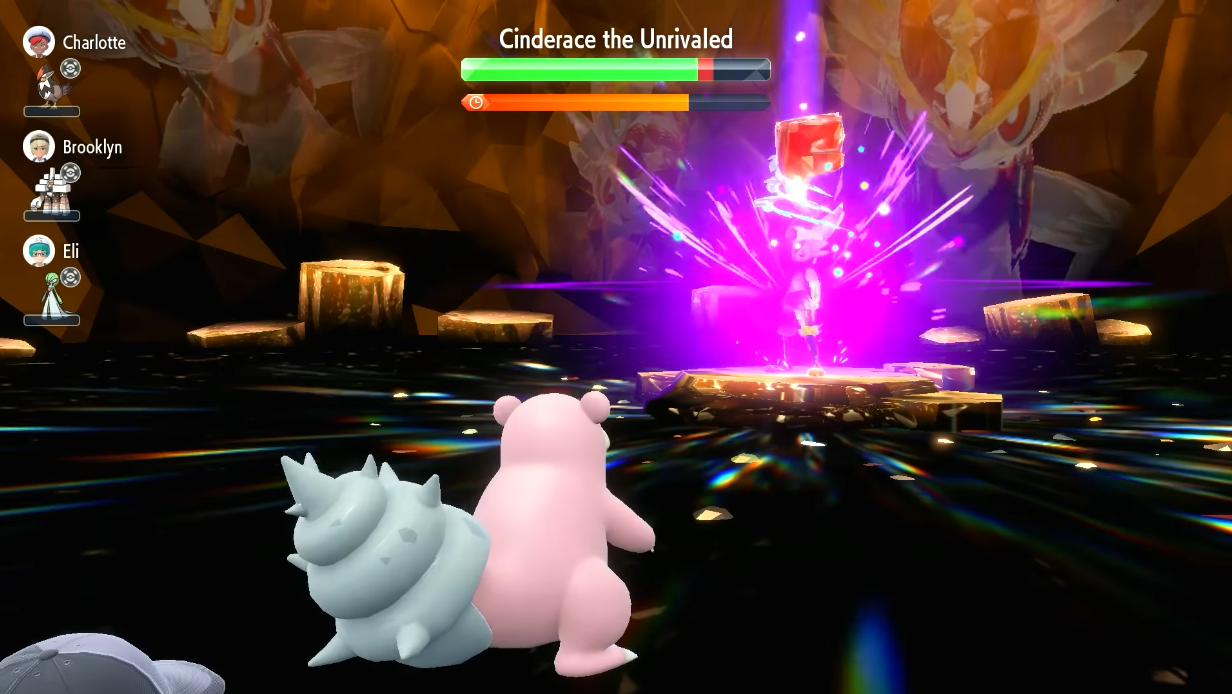 Slowbro uses Stored Power- moments before the damage is shown- against a Tera-Fighting Cinderace in a Tera Raid Battle via Pokémon Scarlet & Violet (2022), Nintendo