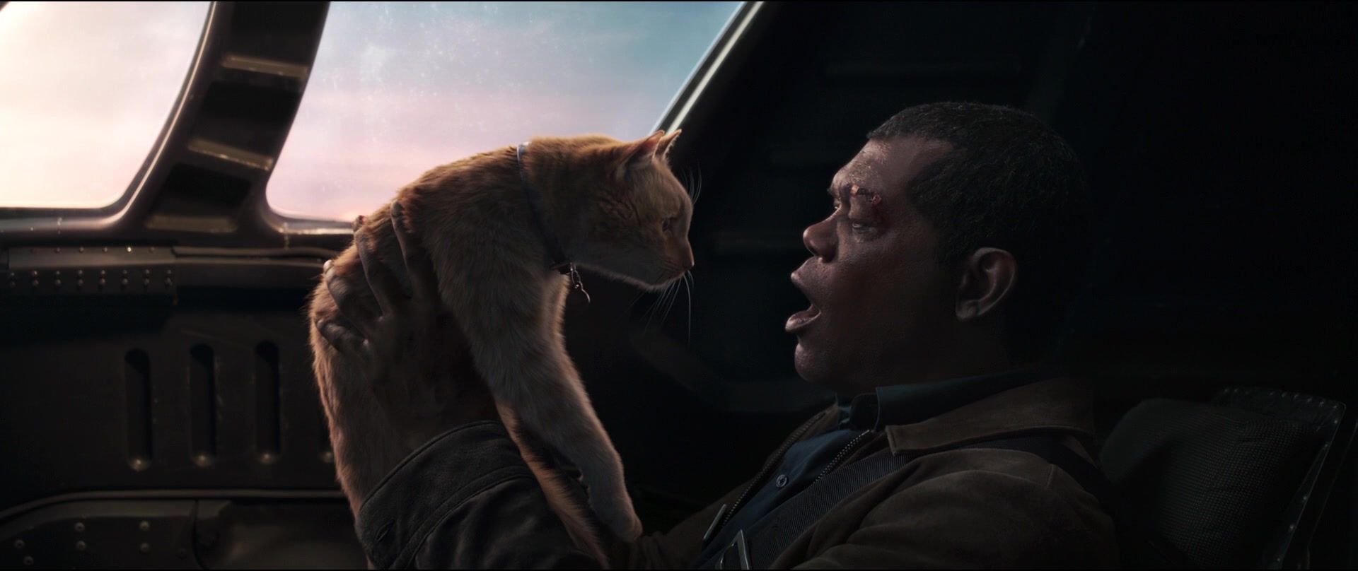 Nick Fury (Samuel L. Jackson) seconds away from losing his eye to Goose the Cat in Captain Marvel (2019), Marvel Entertainment