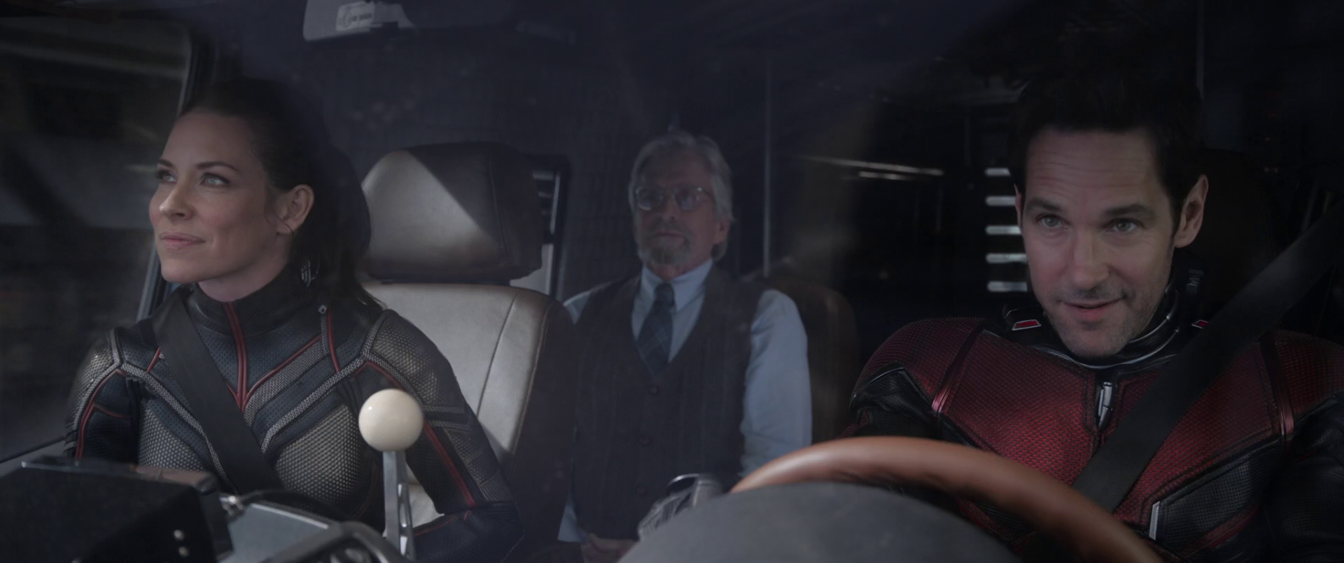 Scott Lang (Paul Rudd), Hope Van Dyne (Evangeline Lily), and Hank Pym (Michael Douglas) search out Sonny Burch (Walton Goggins) in Ant-Man and the Wasp (2018), Marvel Entertainment