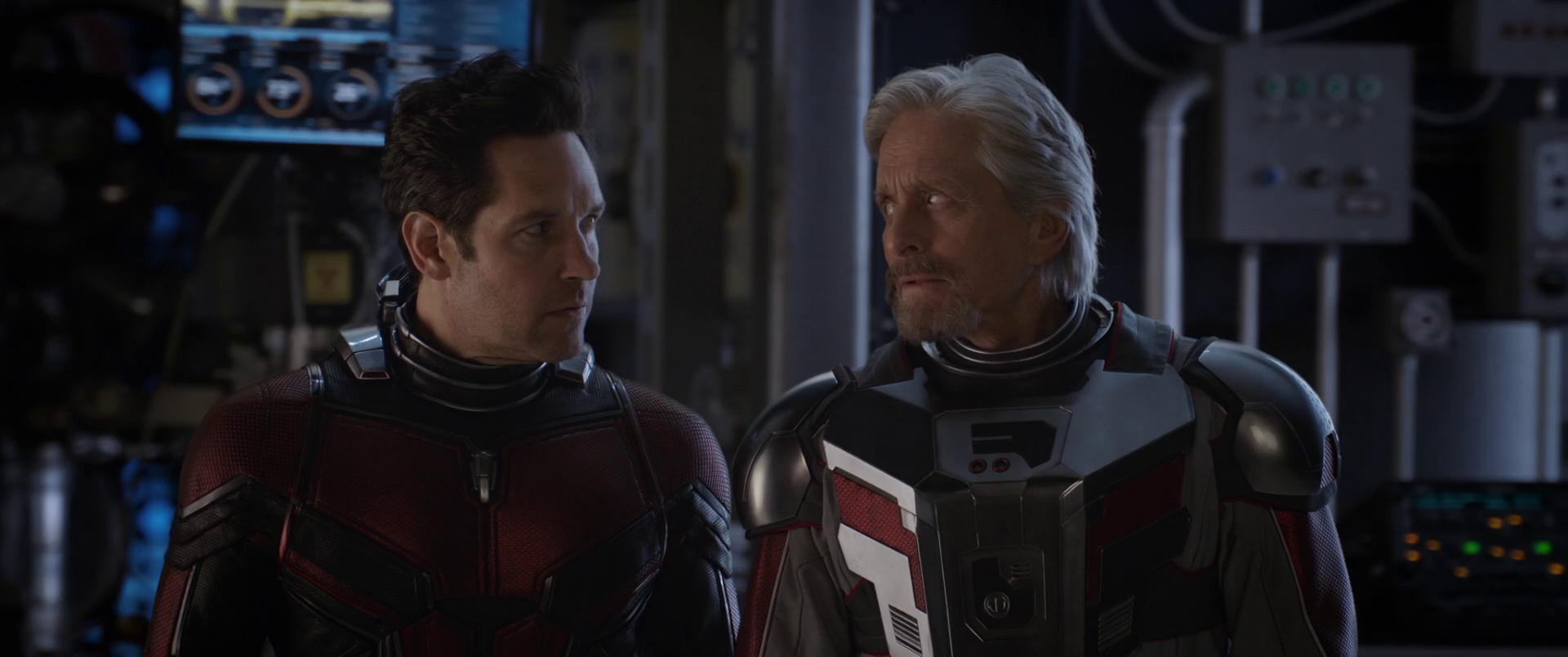 Scott Lang (Paul Rudd) has a question for Hank Pym (Michael Douglas) in Ant-Man and the Wasp (2018), Marvel Entertainment