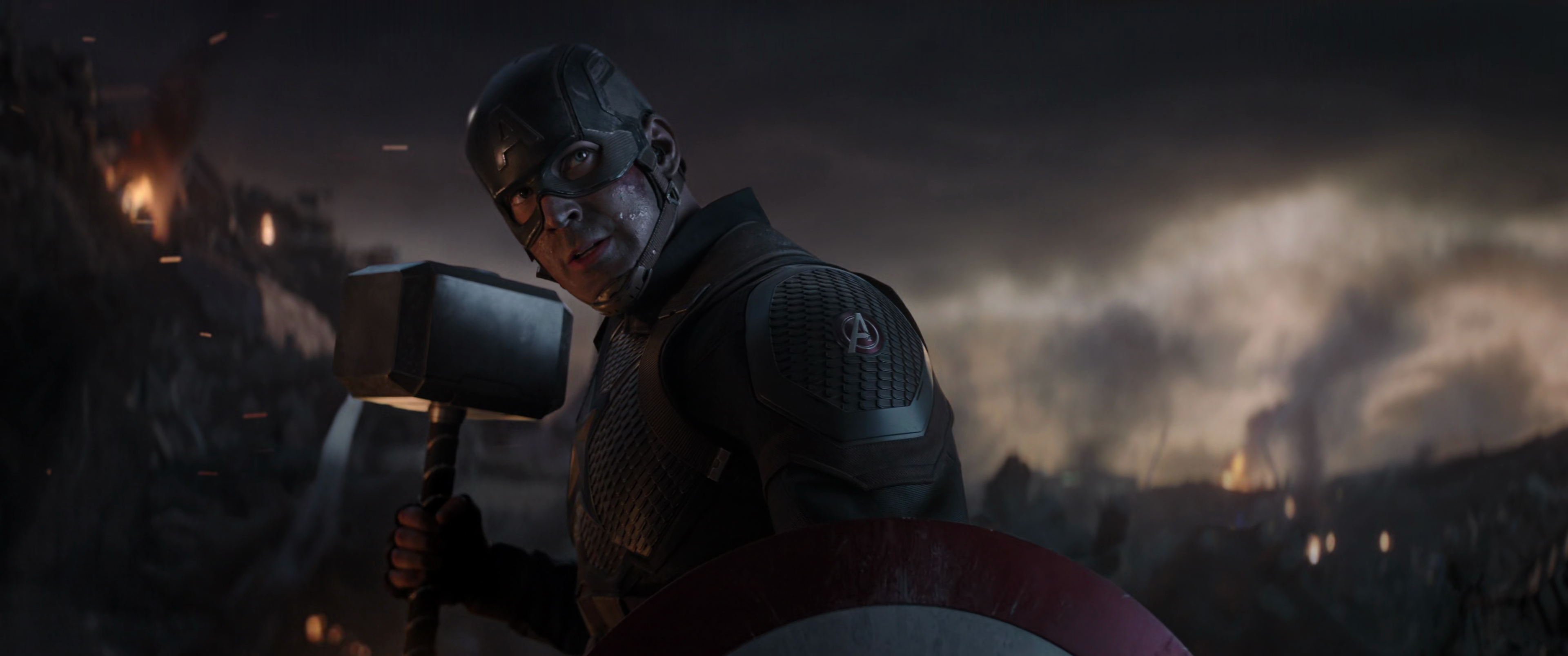 Captain America (Chris Evans) proves himself to be worthy of Mjolnir in Avengers: Endgame (2019), marvel Entertainment