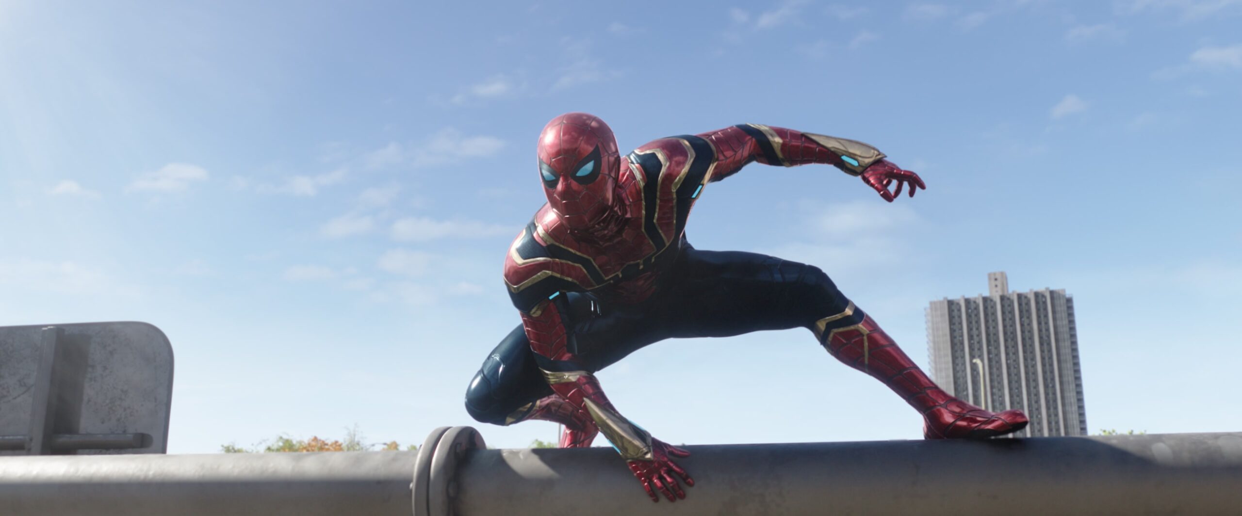 Spider-Man (Tom Holland) responds to reports of a super-villain attack in Spider-Man: No Way Home (2021), Marvel Entertainment