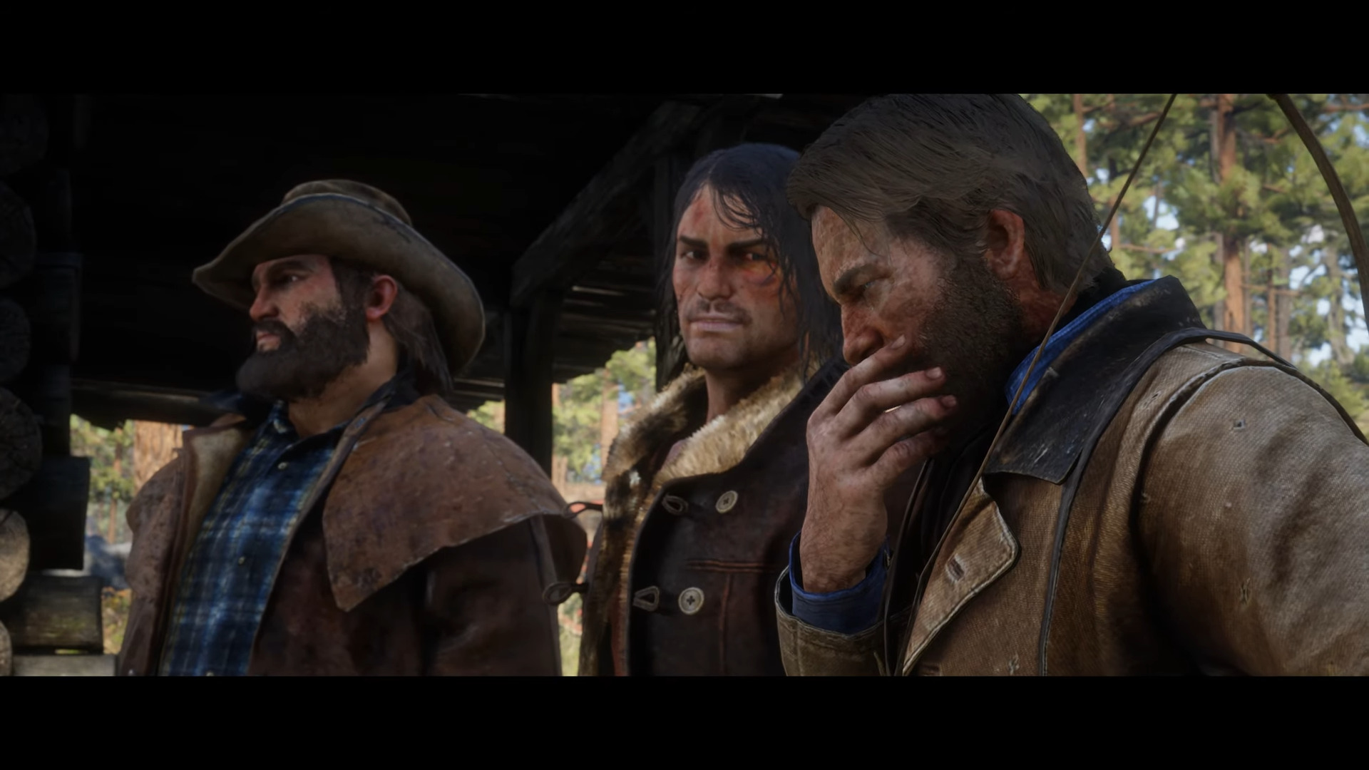 Arthur Morgan, John Marston, and Bill Williamson find themselves at a crossroads regarding what to do with Kieran Duffy in Red Dead Redemption 2 (2018)