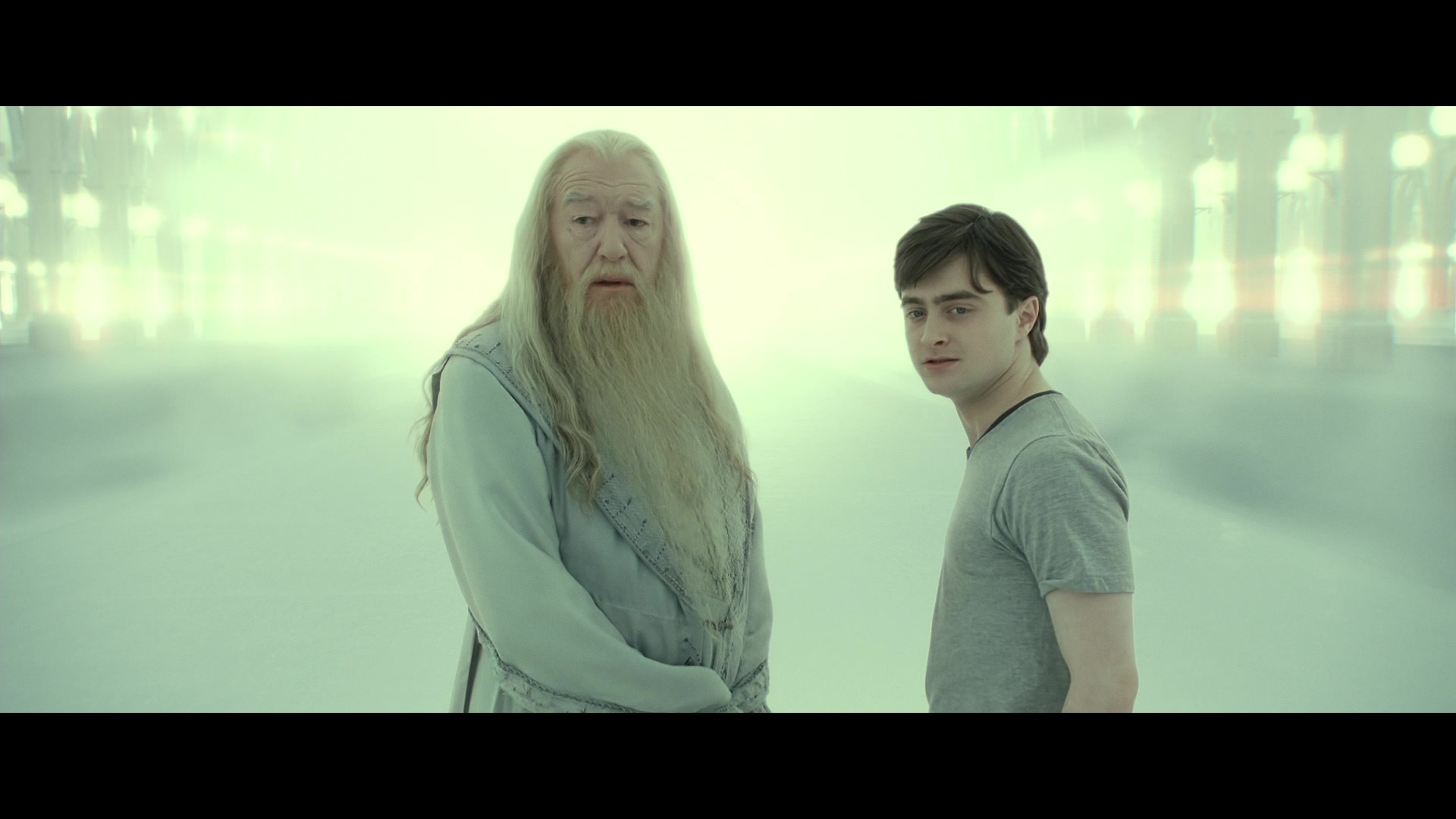 Albus Dumbledore (Michael Gambon) and Harry Potter (Daniel Radcliffe) look upon Lord Voldemort's (Ralph Fiennes) true form in Harry Potter and the Deathly Hallows - Part 2 (2010), Warner Bros. Pictures